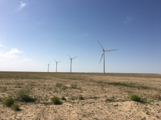 Figure 2. Four of the five wind turbines of the 10-MW wind plant at the Shagaya Renewable Energy Park in western Kuwait.