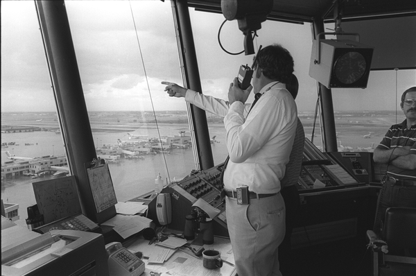 John McCarthy in control tower at Stapleton Airport, Denver, during CLAWS project, 1984